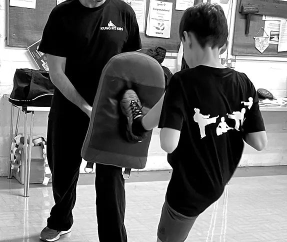 Black & white pictures of children training in Kung Fit Kids